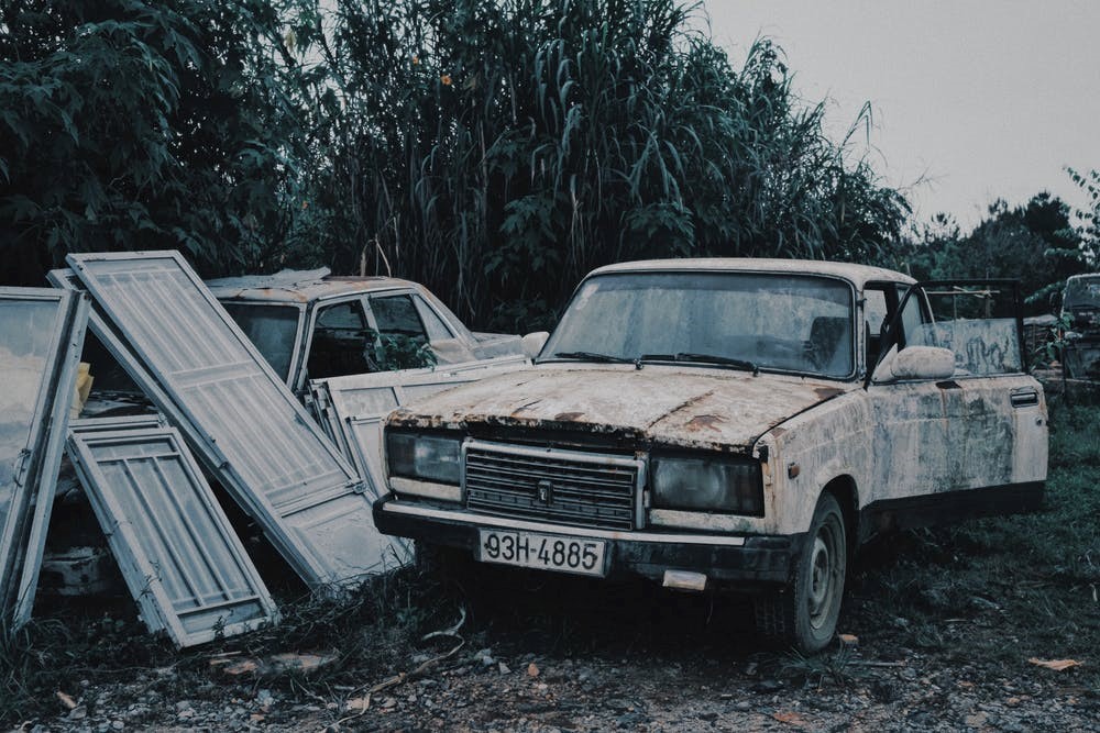 A shabby damaged car that can be easily recycled.