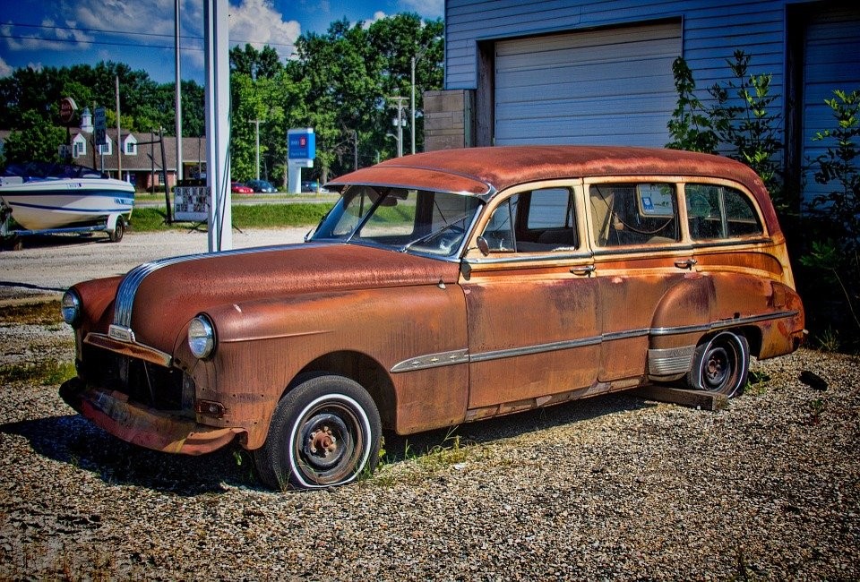 orange rusted junk car