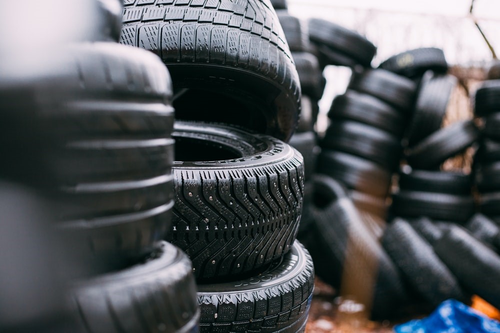 Car tires stacked for sale