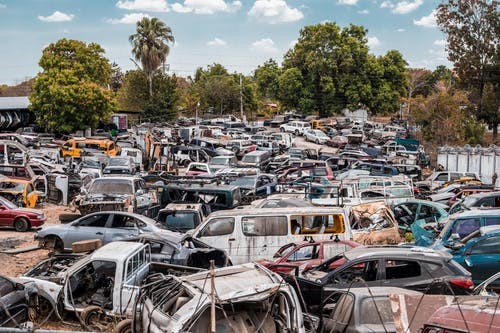 A junkyard with old cars