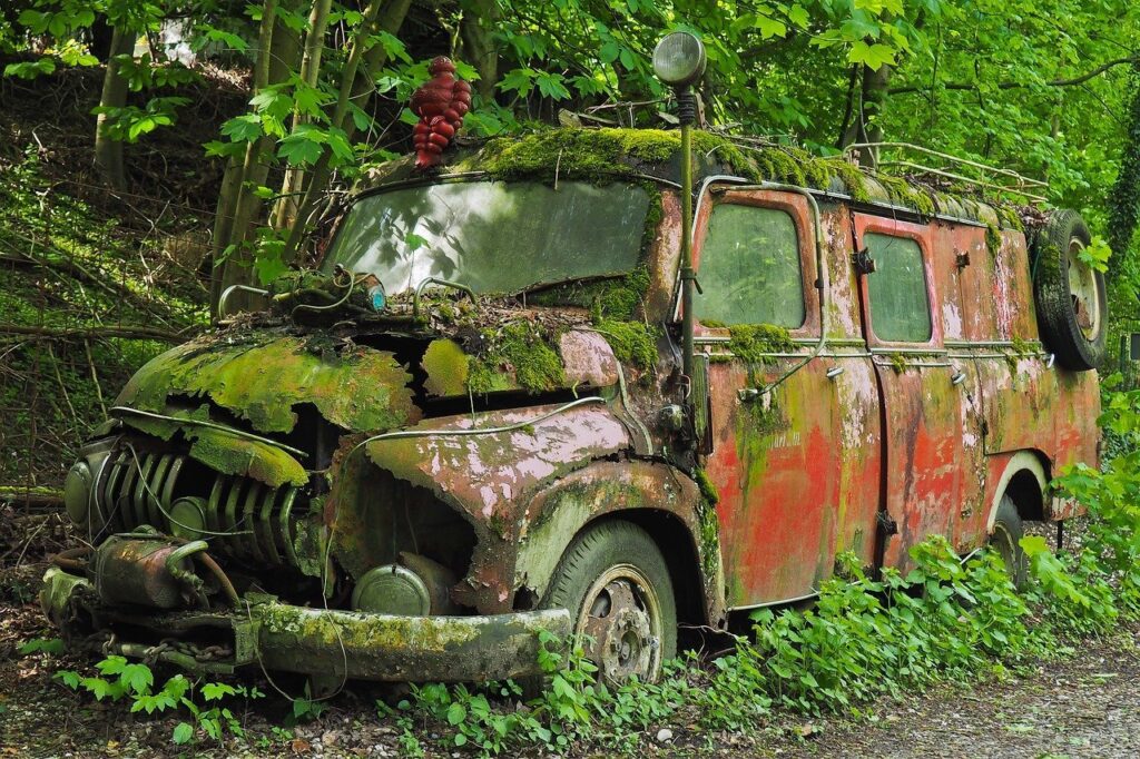 old car in the woods