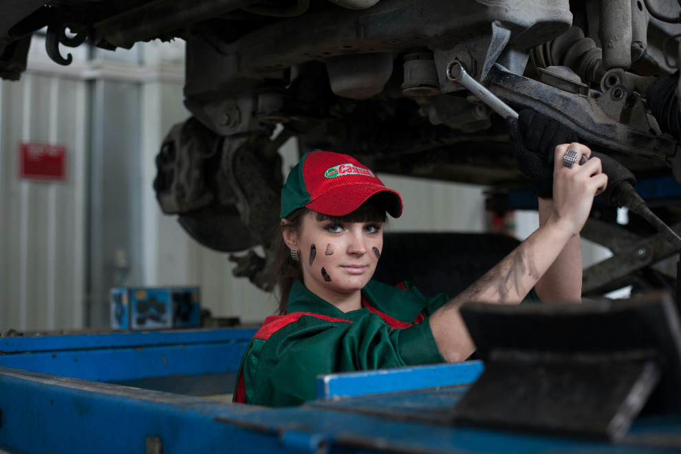 Woman holding a steel wrench