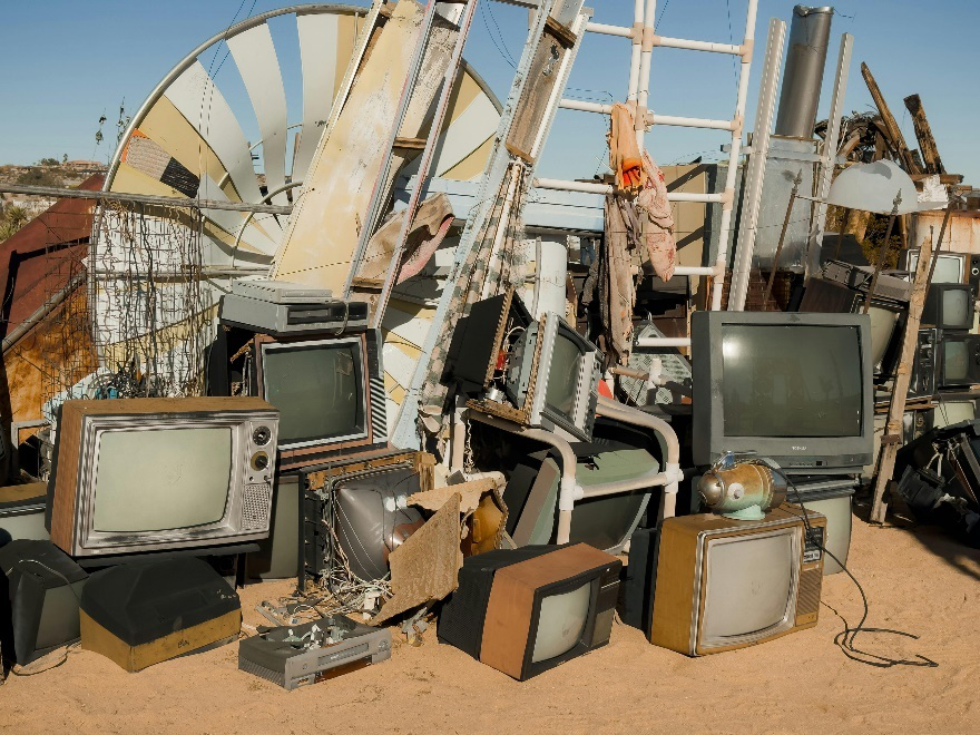 Old rusty cars in a junkyard