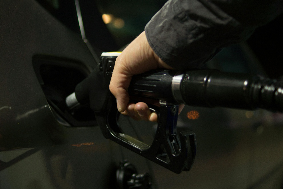 Person using a fuel pump