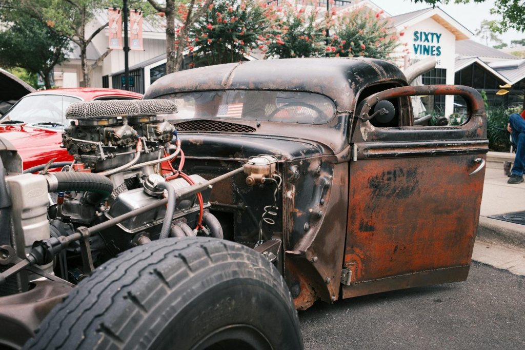 An image of a junk trunk with its engine exposed.